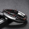 Amalgam bracelet by Tridente in black with onyx and tiger's eye beads.
