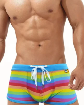 Model in Men's Rainbow Swim Shorts from Moosestrum at Moosestrum.com